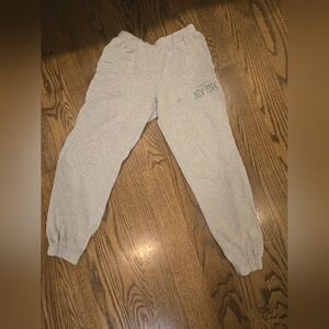 Brandy Melville cuffed grey Rosa sweatpants with green New York